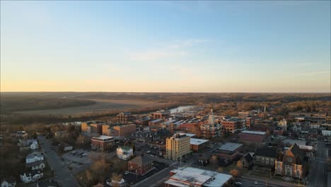 Flying-toward-Clarksville-Tennessee-downtown-area-during-sunset