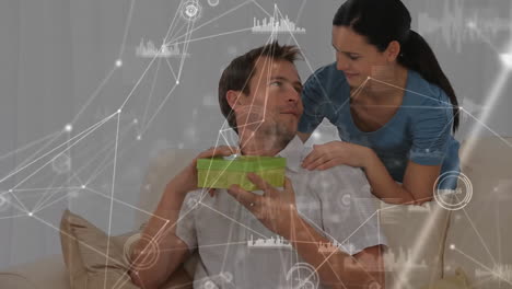 animation of network of connections over caucasian couple smiling