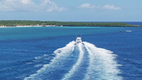 excursion boat drives to island catalina in the dominican republic, aerial orbit