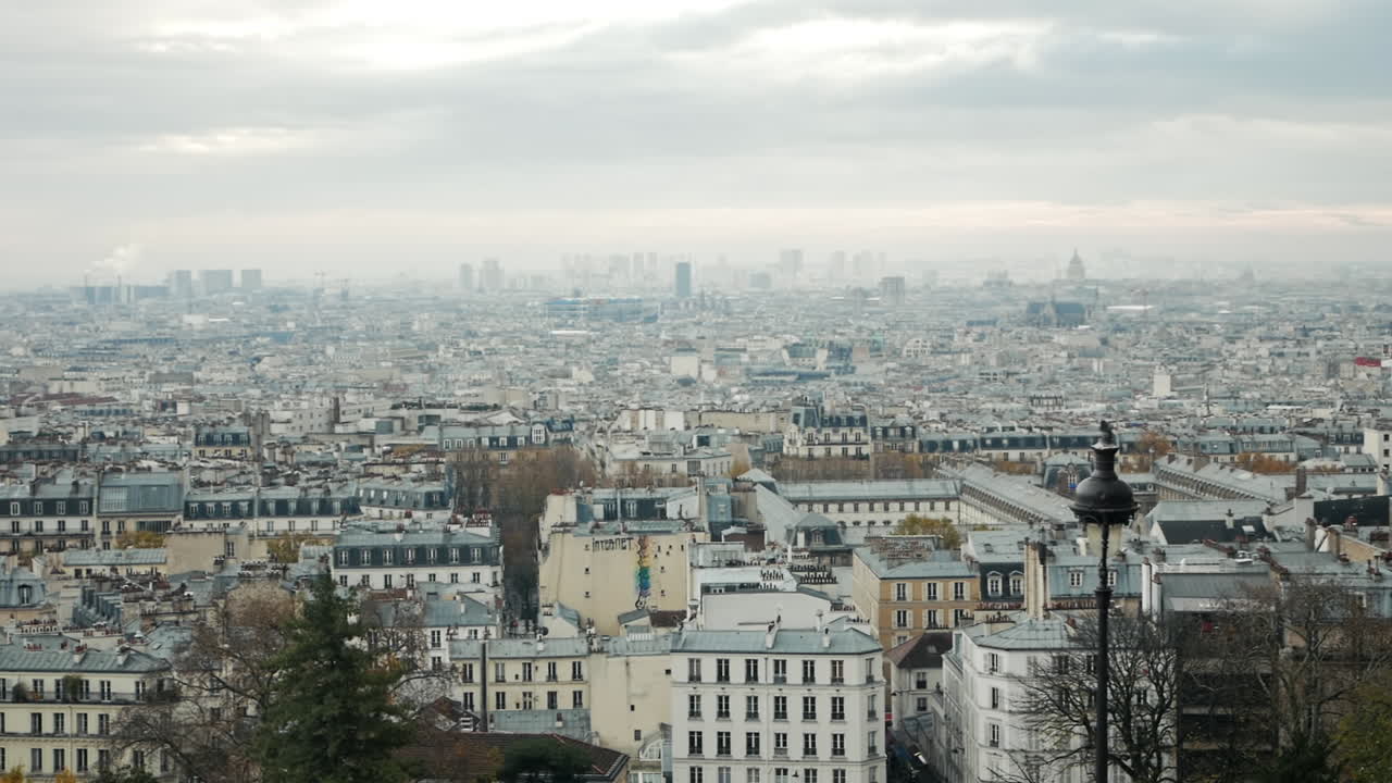 Video of the roofs of Paris seen from Montmartre hill on a gloomy autumn day