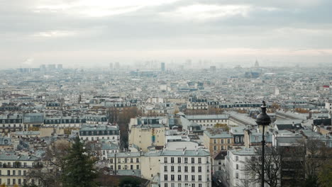 video of the roofs of paris seen from montmartre hill on a gloomy autumn day