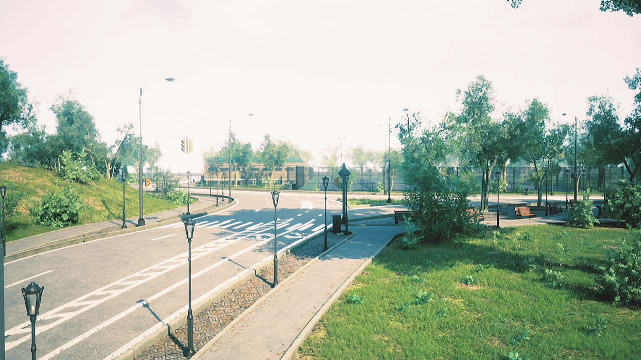 Walking path in a tranquil park surrounded by greenery and light posts