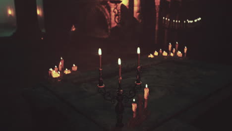 candles on a stone altar in a dark church