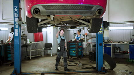 women working on repair shop