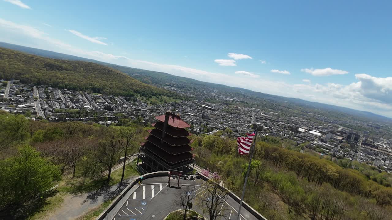 Aerial View of a Pagoda Overlooking a City