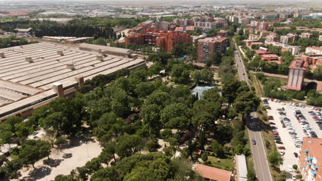 apartment buildings and streets of madrid, aerial orbit view