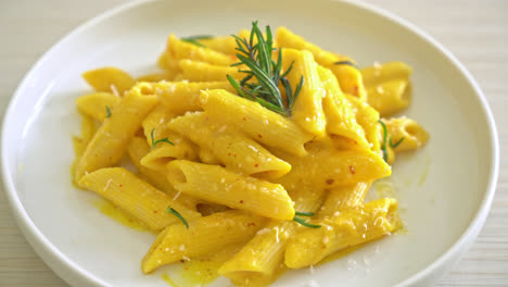 penne pasta with butternut pumpkin creamy sauce and rosemary