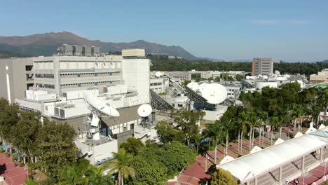 Cluster-of-Satellite-broadcast-Dishes-on-Hong-Kong,-Aerial-view