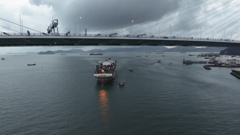 Driving-cars-on-Stonecutter-bridge-at-cloudy-day-in-China