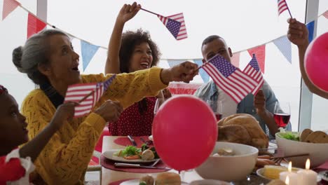 multi-generation family having celebration meal