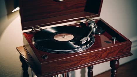 vintage record player on a wooden stand, captured in a warm, nostalgic style