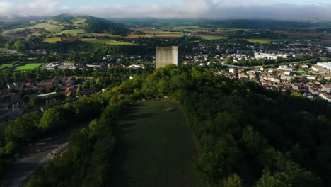 Aerial-view-of-the-tower-of-Crest,-a-town-in-the-Drôme,-region-of-Auvergne-Rhône-Alpes,-France