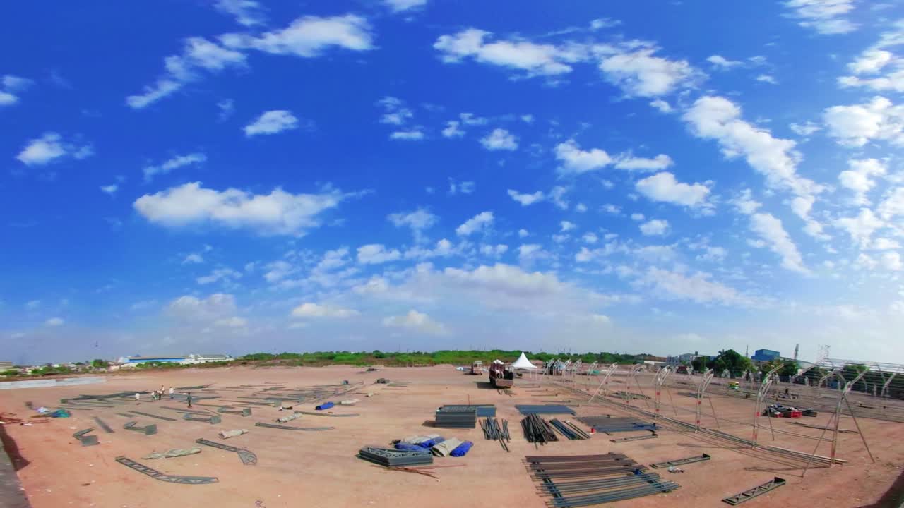 Different parts of metal scaffold on the construction field, Workers build an industrial doom, worker build a concert stage, stage, timelapse of Hugh contraction on-site collection