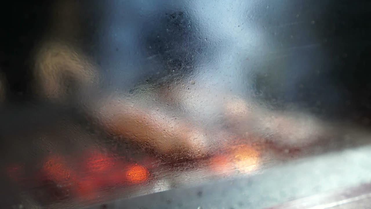 Blurry background of Delicious eel on grill near mirror
