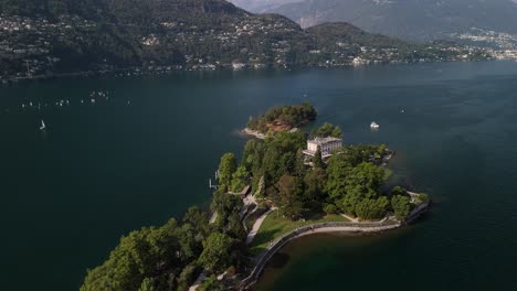 pan shot of the second largest lake in italy located on the southern side of the alps on the island of brissago.