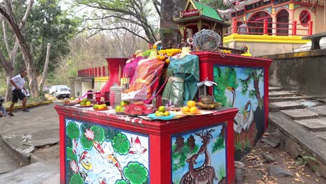 preparation and offerings at a vibrant shrine