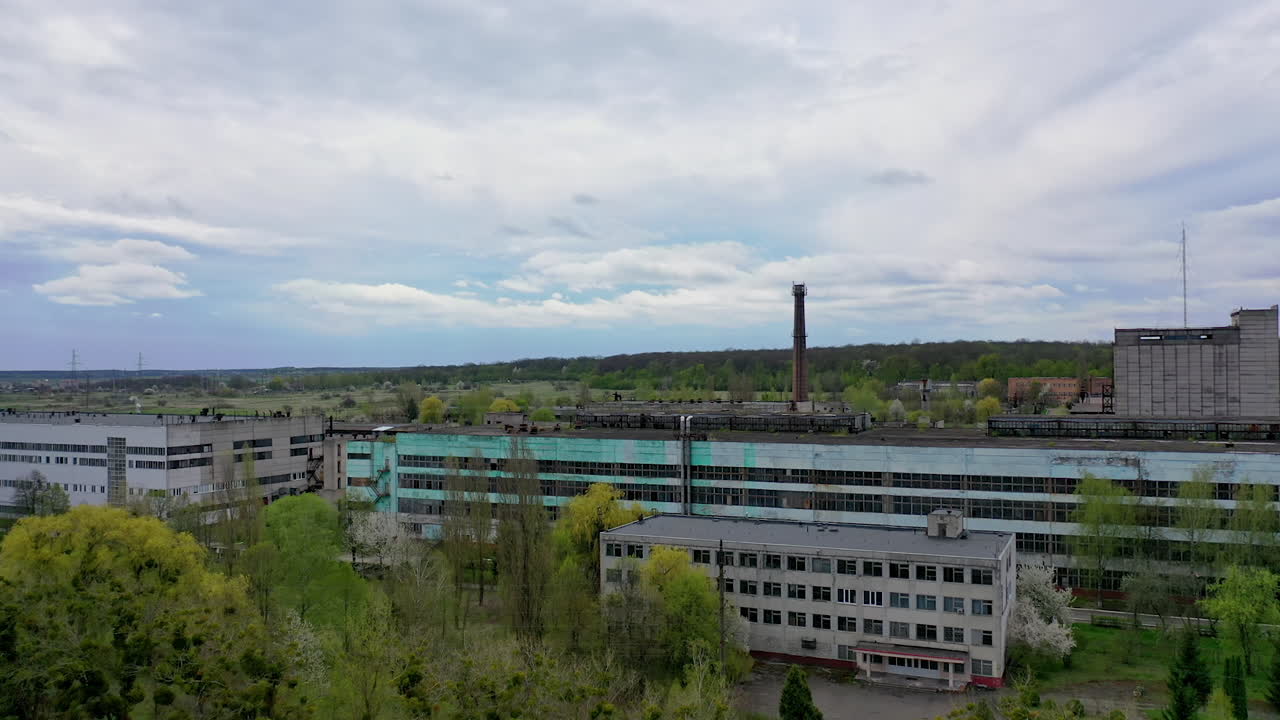 Aero view of ruined city full of disaster. Abandoned houses in ruined city.