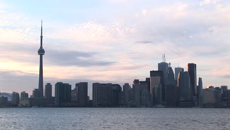 toronto's cn tower dwarfs the remaining skyscrapers in this toronto skyline picture