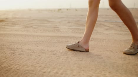 woman walking in the desert