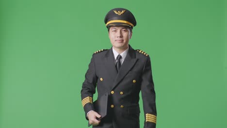 pilot in uniform with tablet