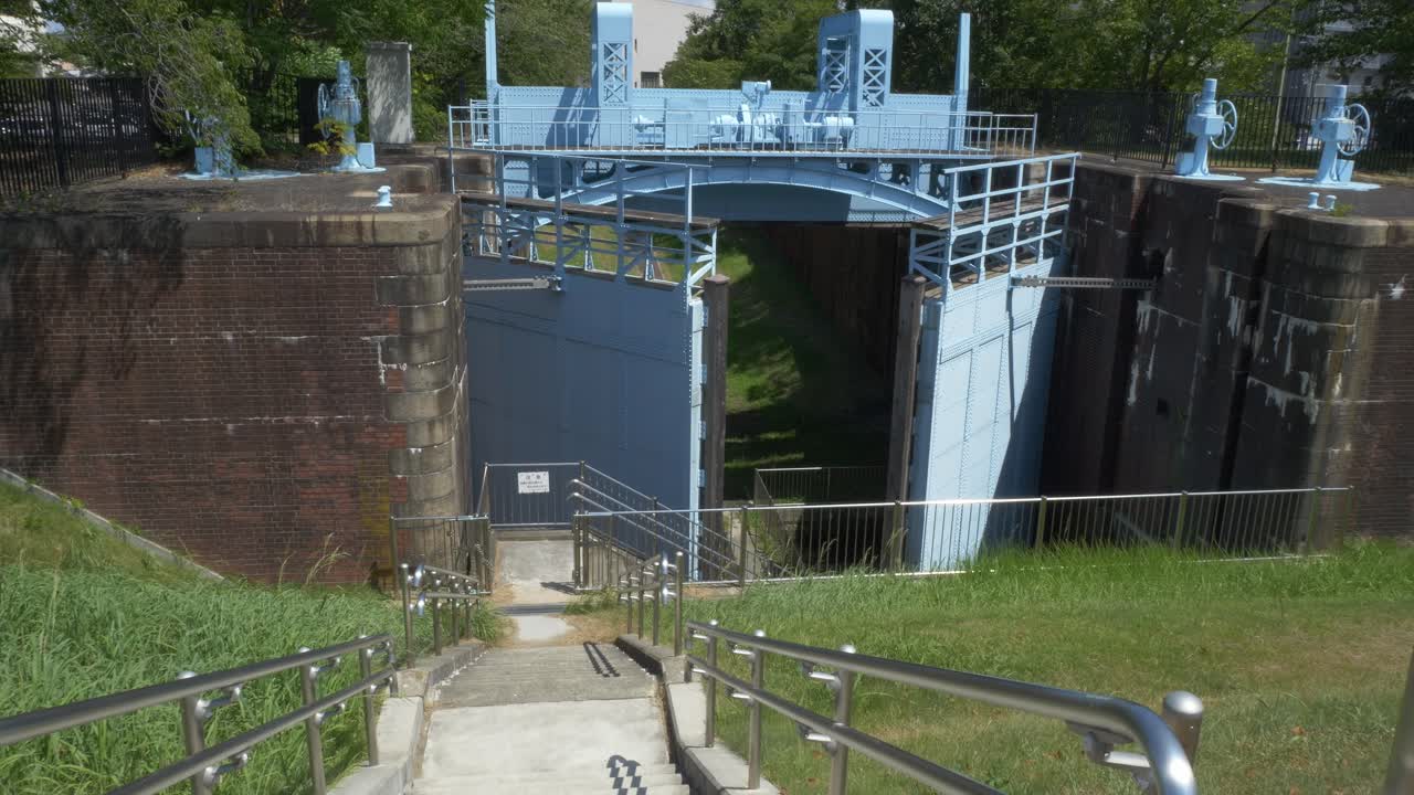 Stairs Leading To Old Kema First Lock, Historical Landmark At Yodogawa River Park Nagara Riverside Area In Osaka, Japan. - wide shot