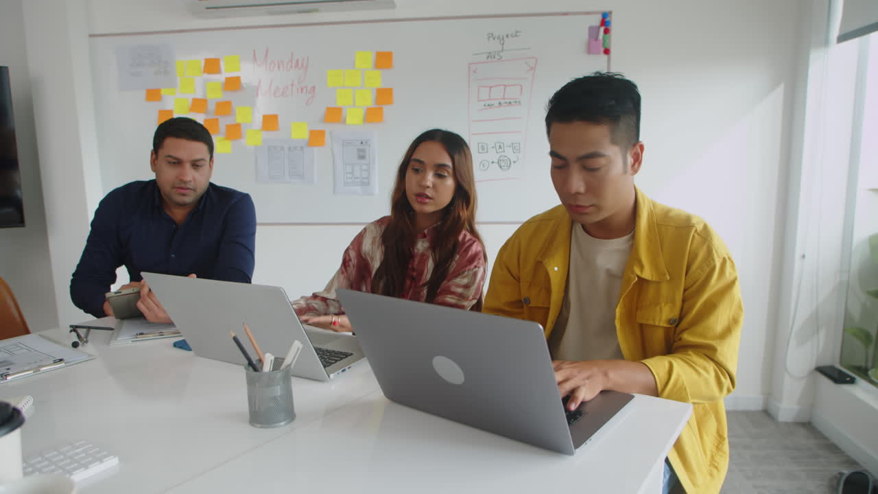 Team Talking about New Software at Office
