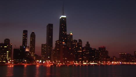 a postcard perfect view of the chicago skyline at night