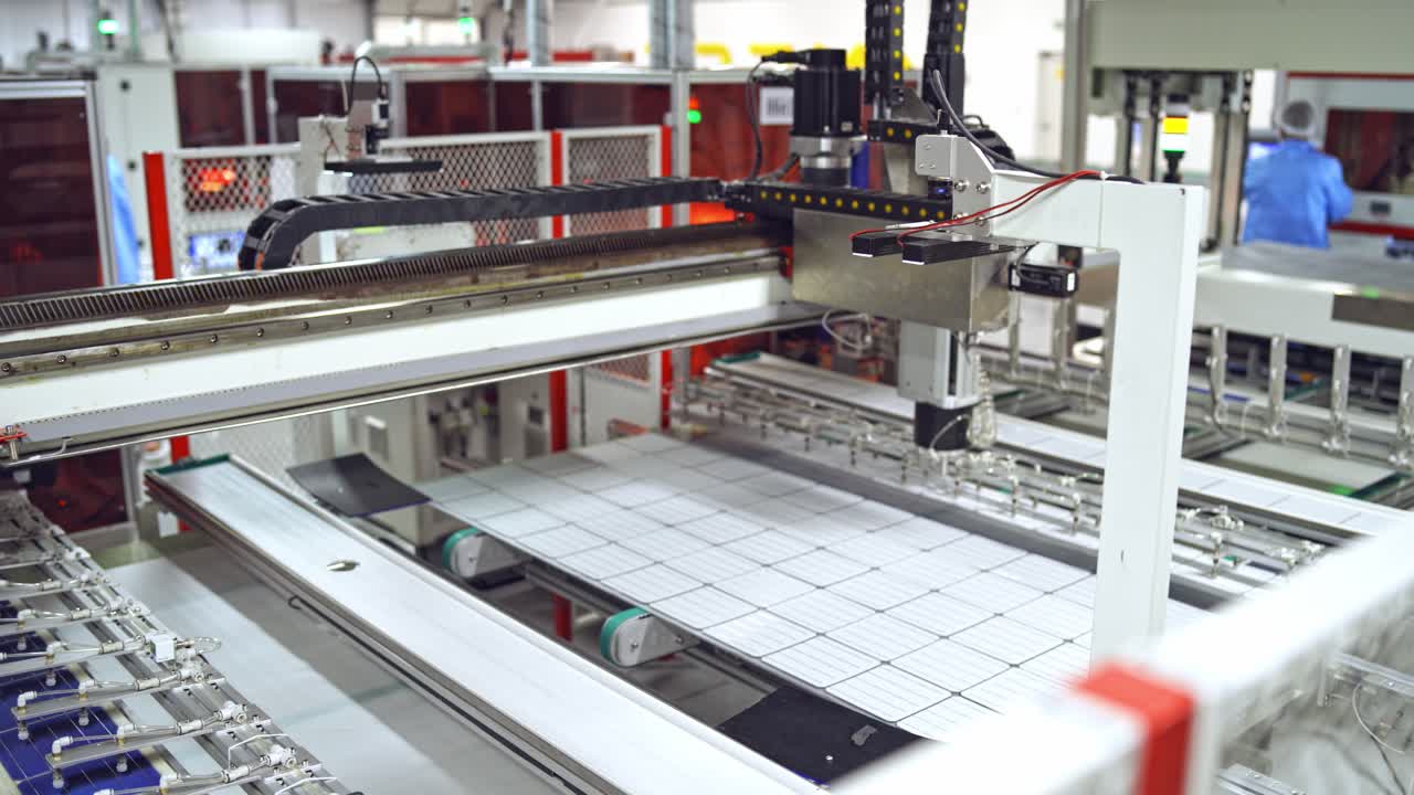 Footage of a working factory mechanism of solar cells distribution. Automated solar energy production. Contemporary factory for producing solar panels.