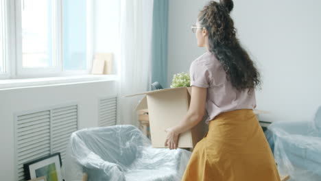 woman moving into new apartment