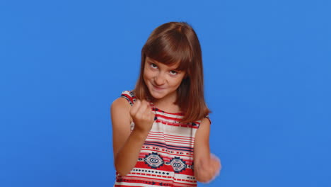 aggressive angry mad bully child kid girl trying to fight at camera shaking fist boxing abuse