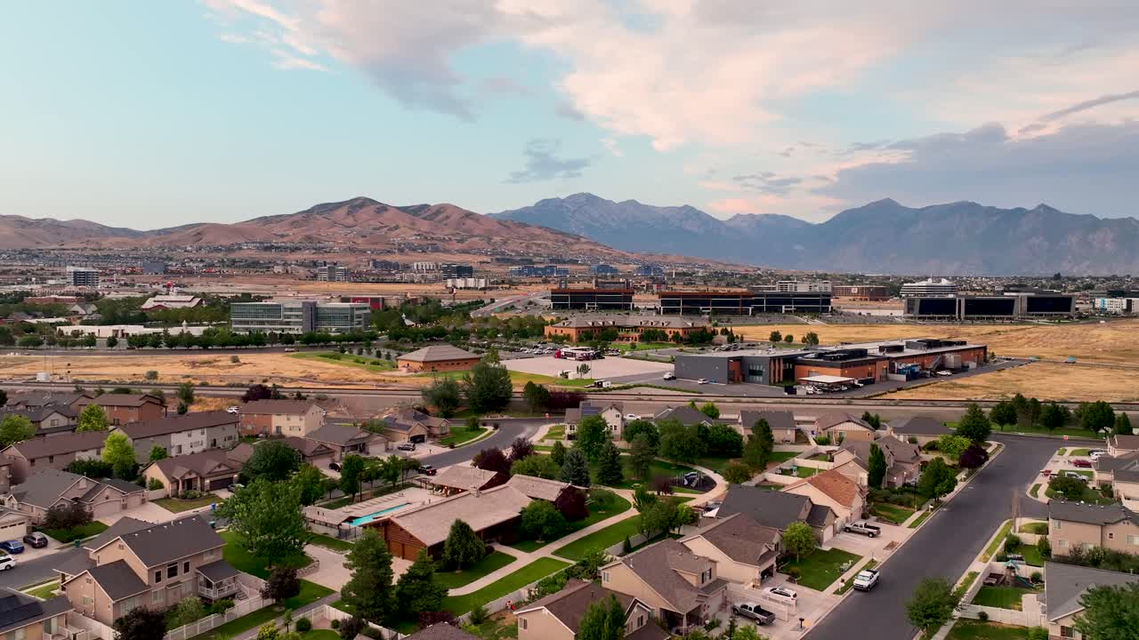 Suburban Lehi Neighborhood And Silicon Slopes Business Park, Tech Hub In Utah. Sunset aerial Flyover