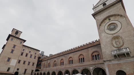 a view of complex buildings at palazzo della ragione in mantua, italy. panning left