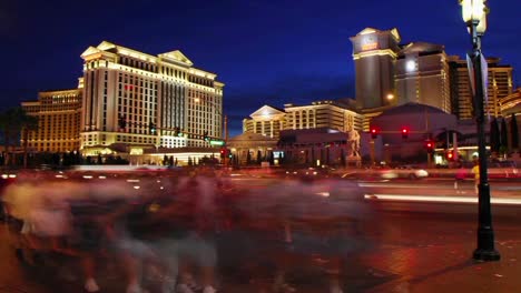 a time lapse of pedestrians and vehicles near hotel casinos in las vegas 1