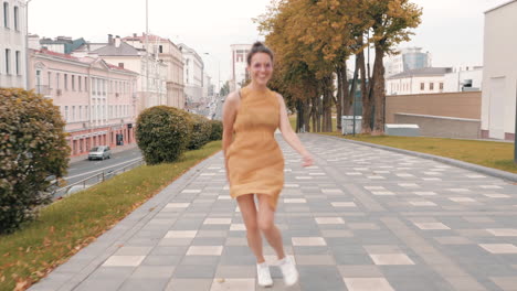 woman walking in city during autumn