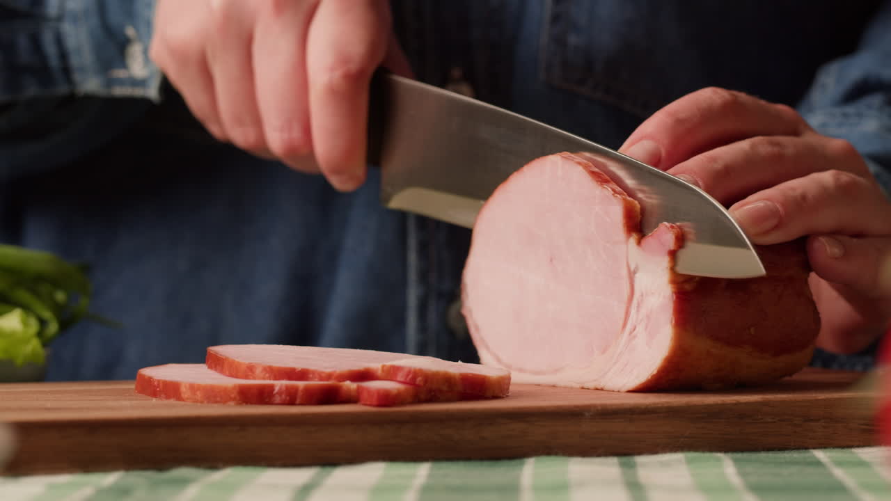 Slicing a Round of Ham