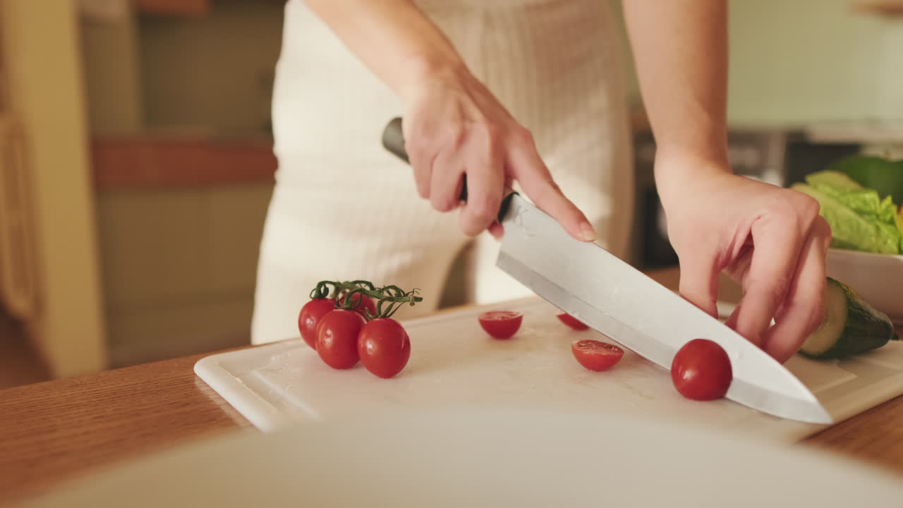 Woman Preparing Salad in the Kitchen
