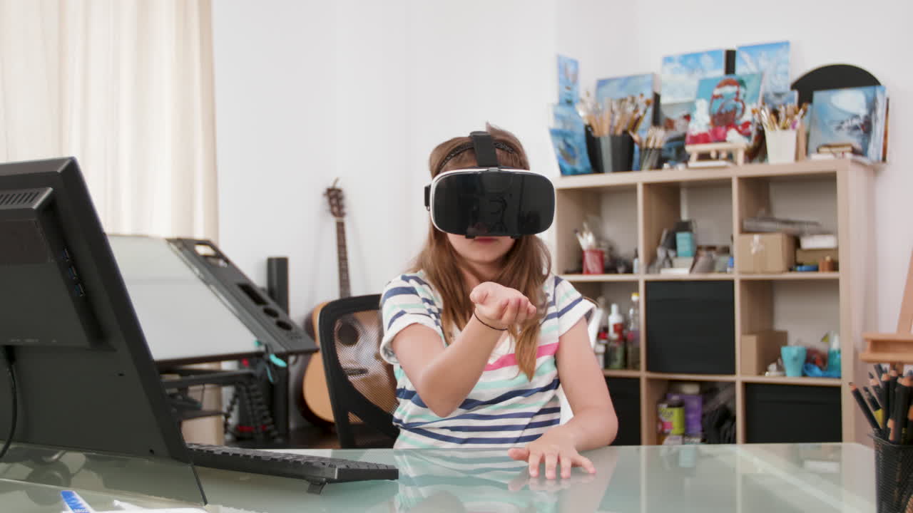 Girl using VR headset at desk