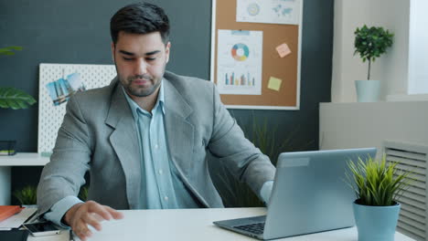 businessman working on laptop in office