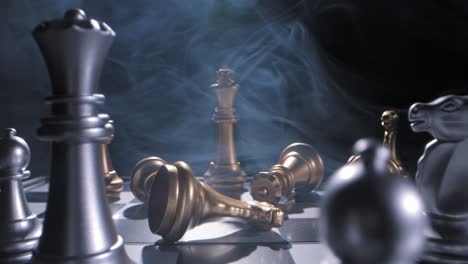 Smoky-sliding-shot-of-the-lone-king-on-a-chessboard-surrounding-by-enemies