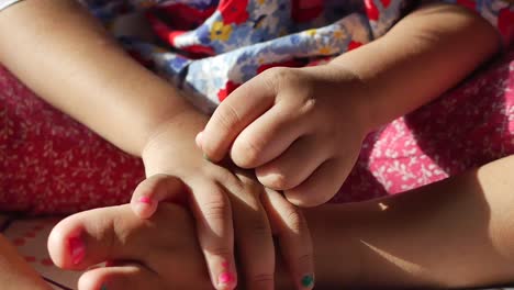 child girl suffering from itching skin, close up