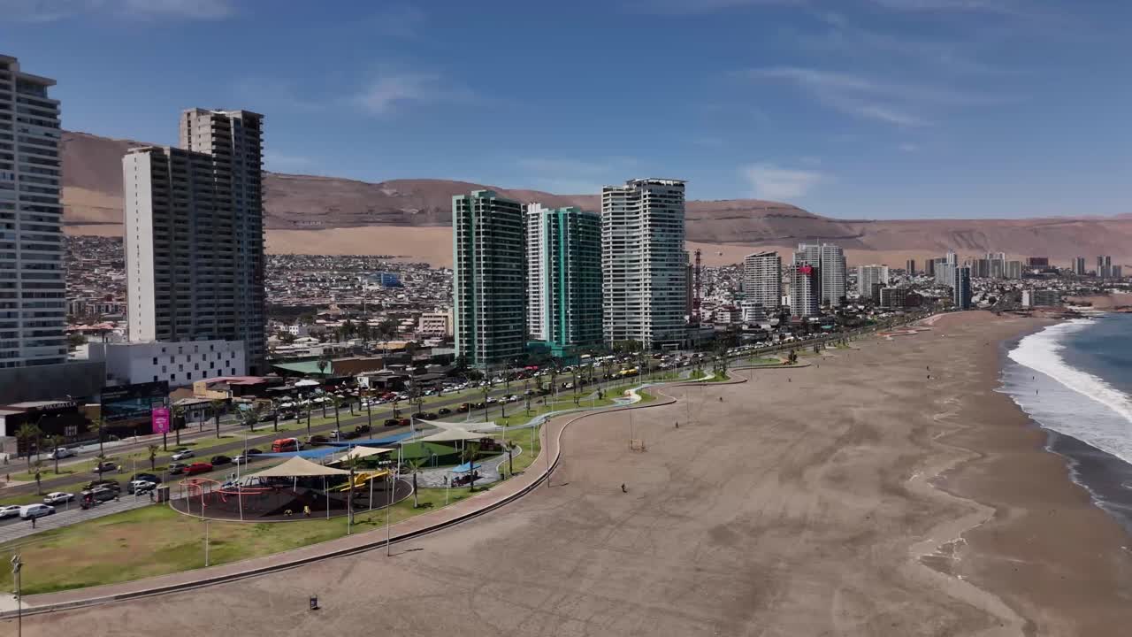 Iquique playa brava chile tarapaca cavancha day beach blue sky city
