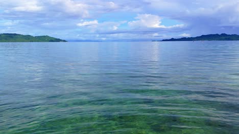 generic tropical ocean vacation tourism view over tropical waters in the early morning. dinagat island philippines