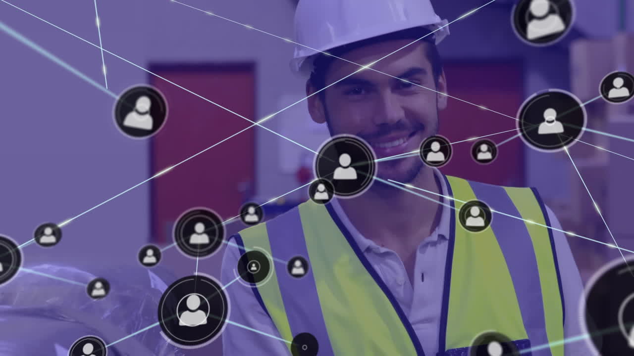 animación de una red de iconos de perfil sobre un trabajador masculino biracial sonriendo en el almacén.