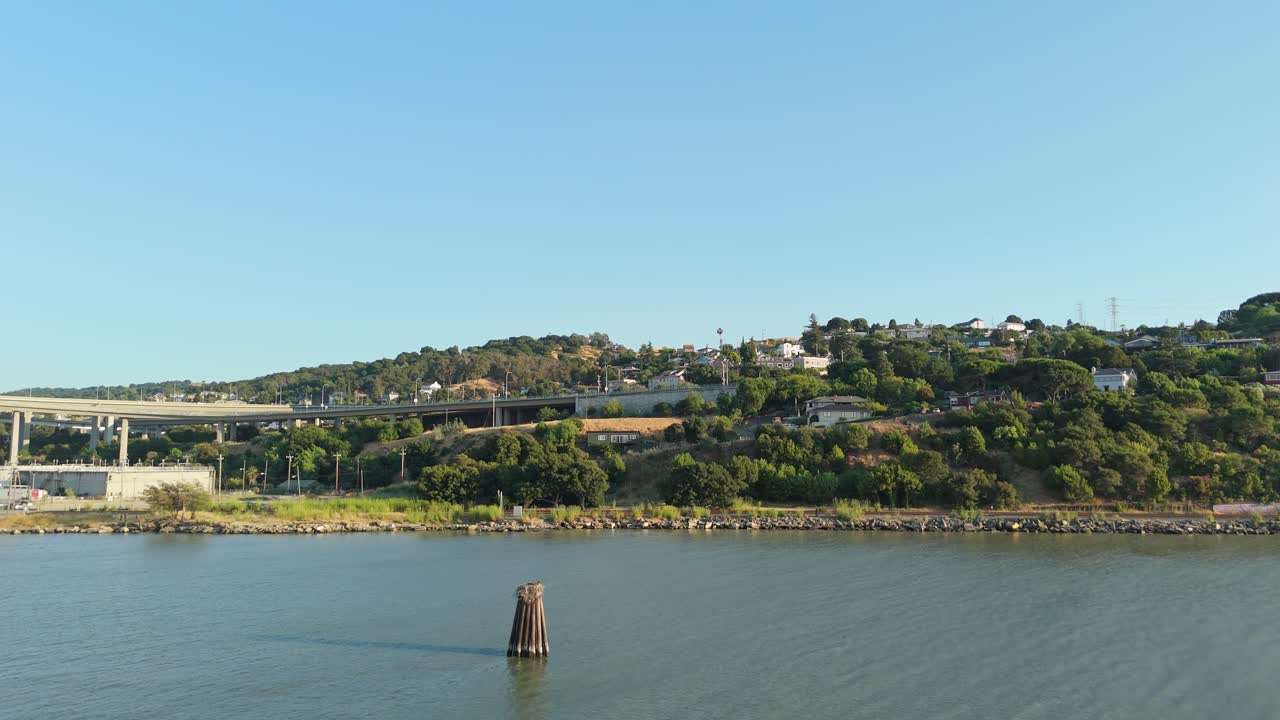 A slow aerial push in of the waterfront in Crocket California.