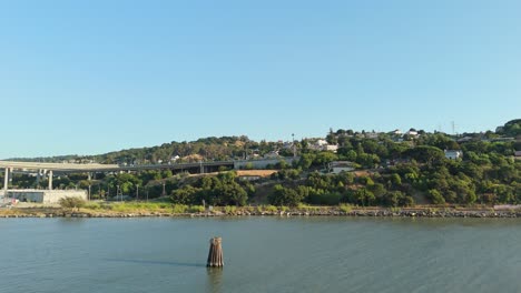 a slow aerial push in of the waterfront in crocket california.