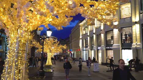 kuznetskiy most street, moscow, russia. night view on the illuminated street