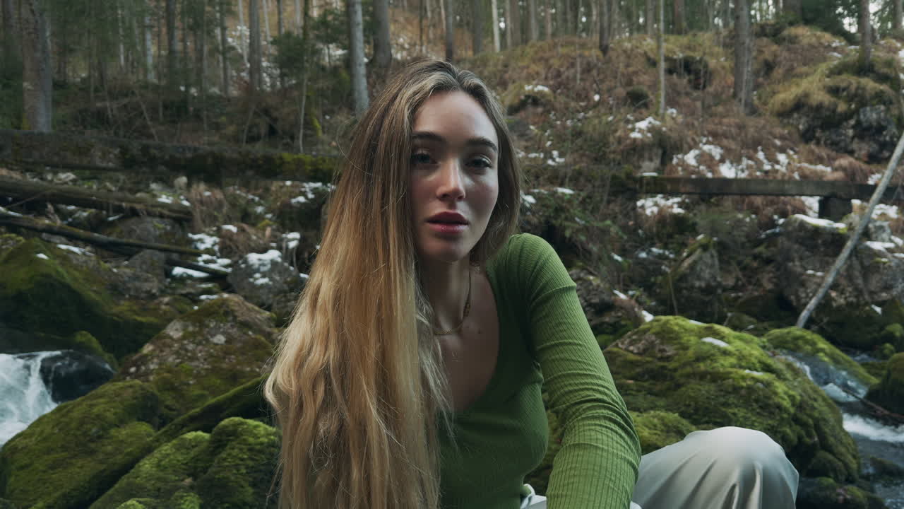 Woman in a Forest by a Stream