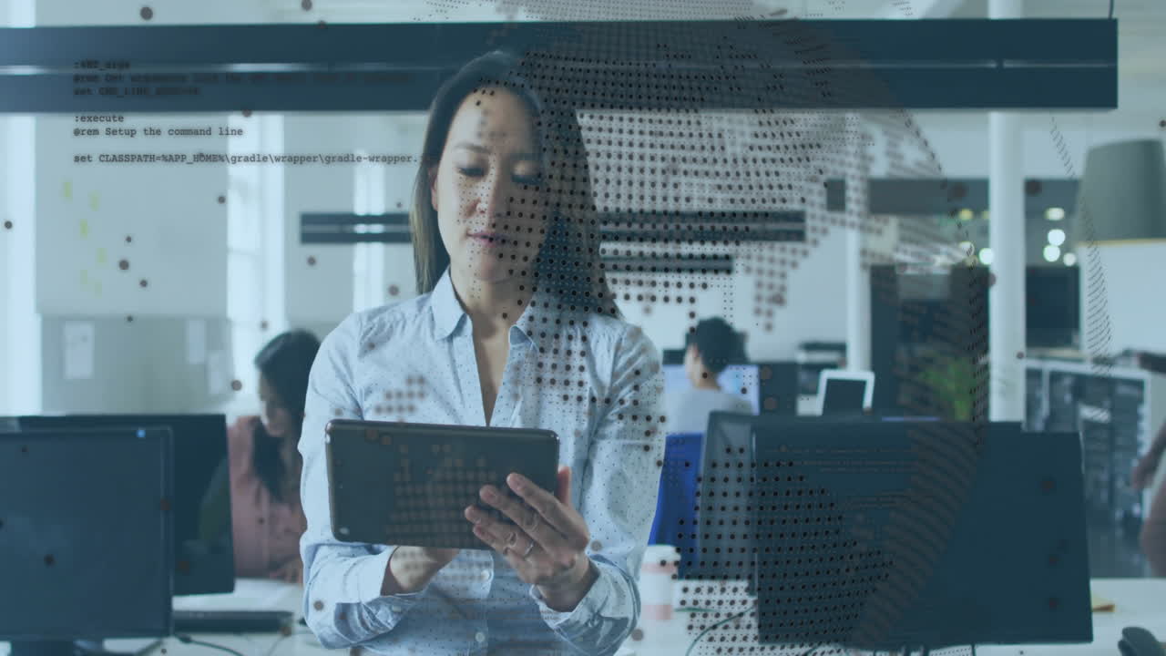 Using tablet with digital world map, businesswoman working in modern office