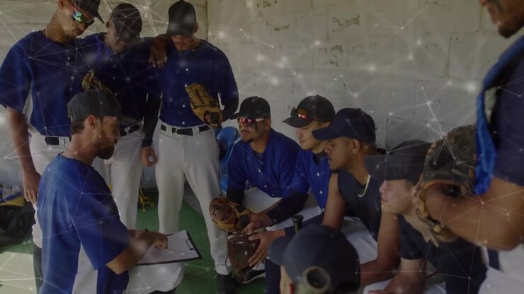 Squadra di baseball che elabora strategie nel dugout con sovrapposizione animata di connessioni di rete