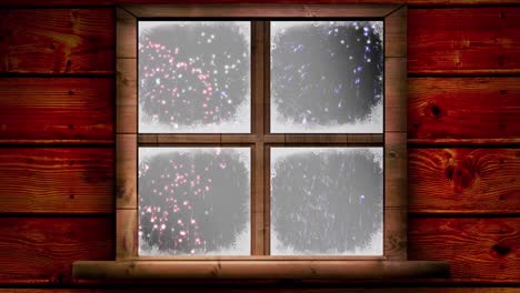 Digitale-Animation-Eines-Hölzernen-Fensterrahmens-Vor-Explodierenden-Feuerwerkskörpern-In-Der-Winterlandschaft